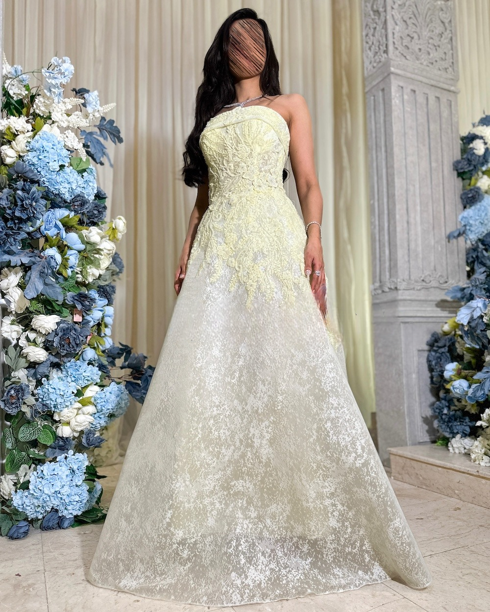 Light lemon evening dress with a sleeveless collar