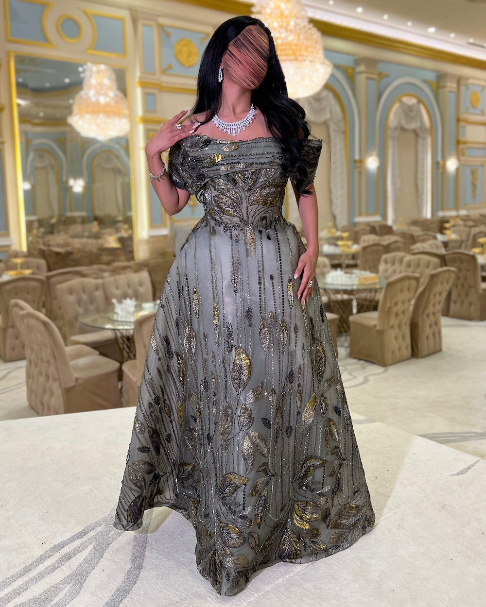 Gray evening dress with gold and glitter accents