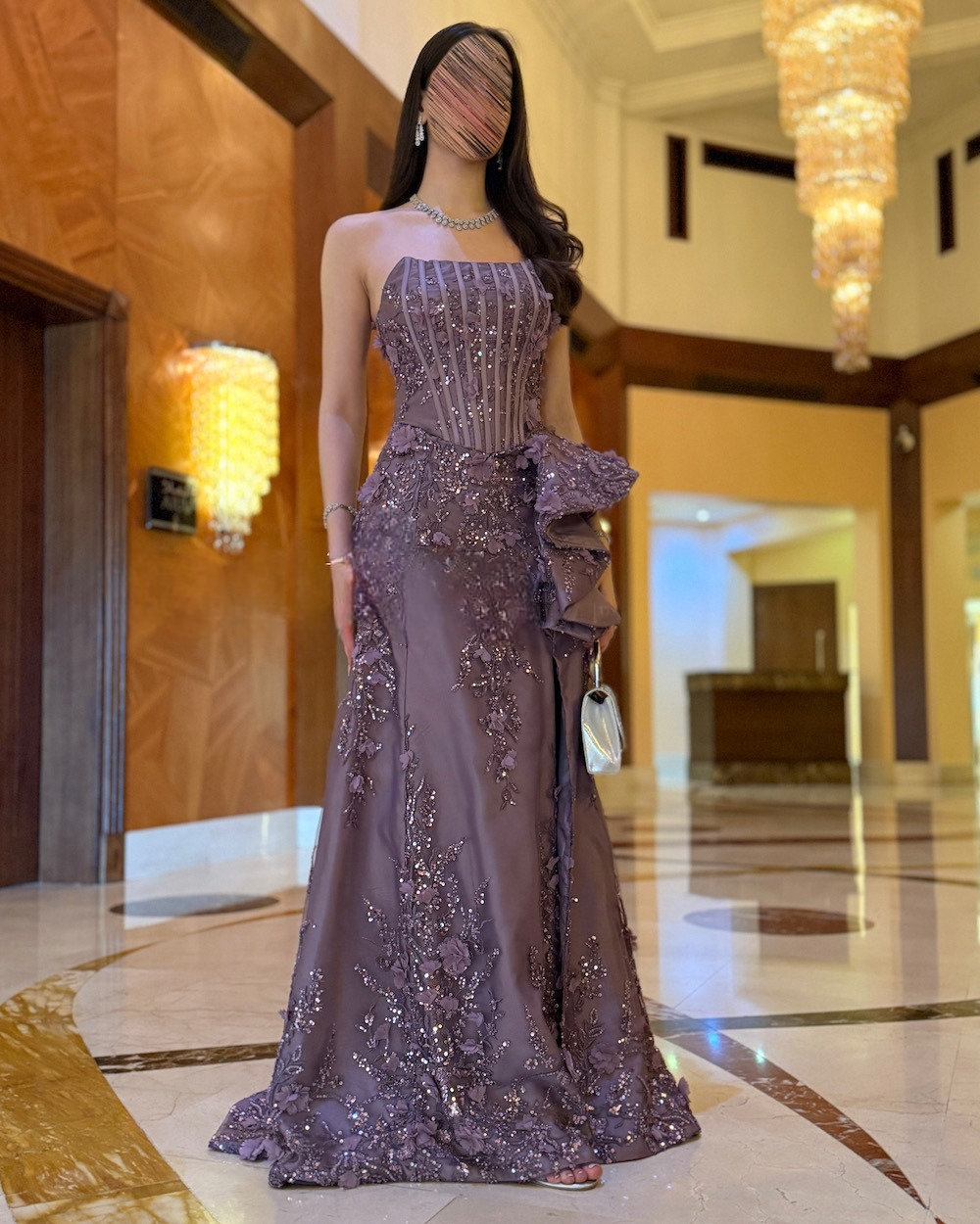 Purple evening dress with a corset bodice and embroidery