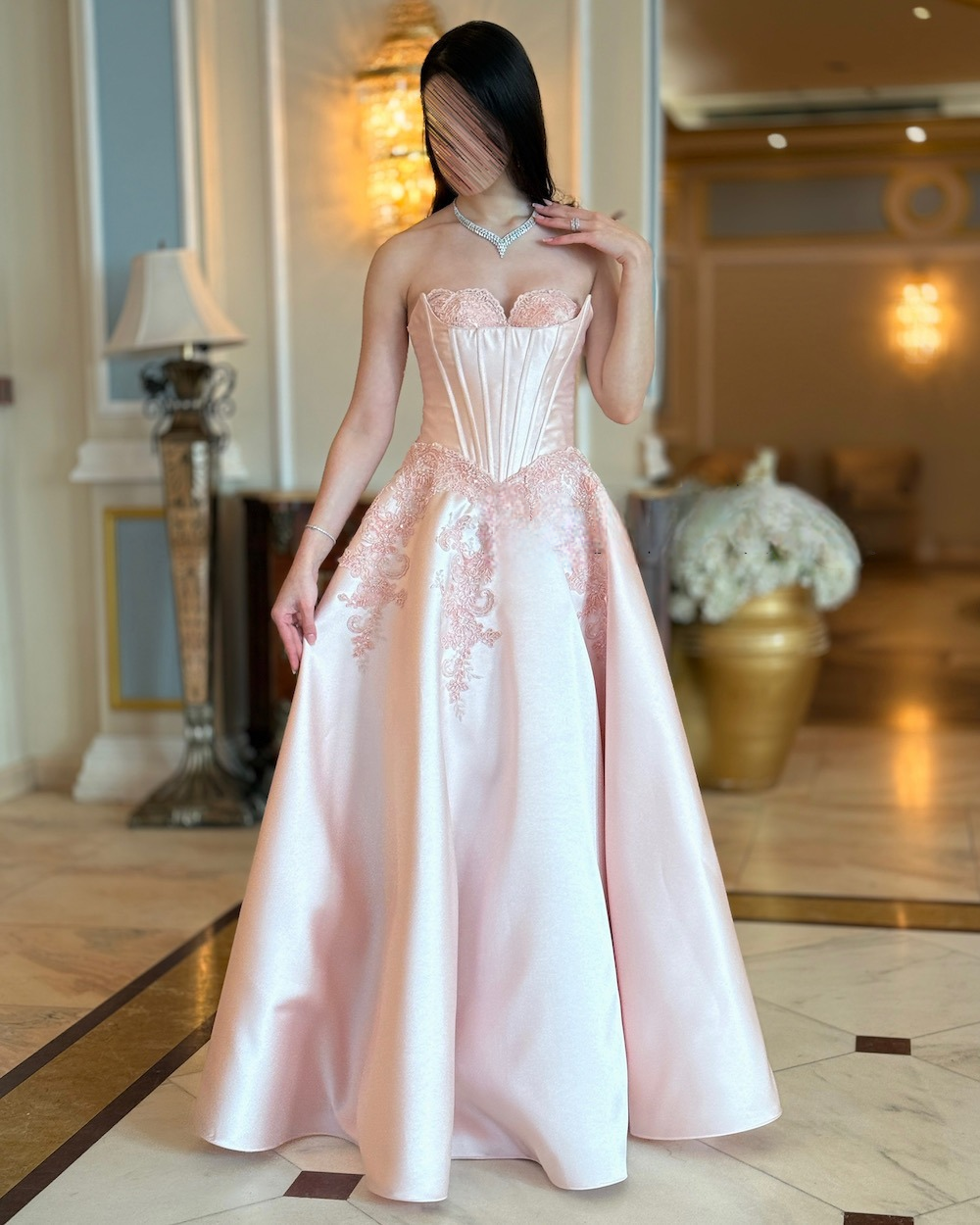 Light pink evening dress with lace details
