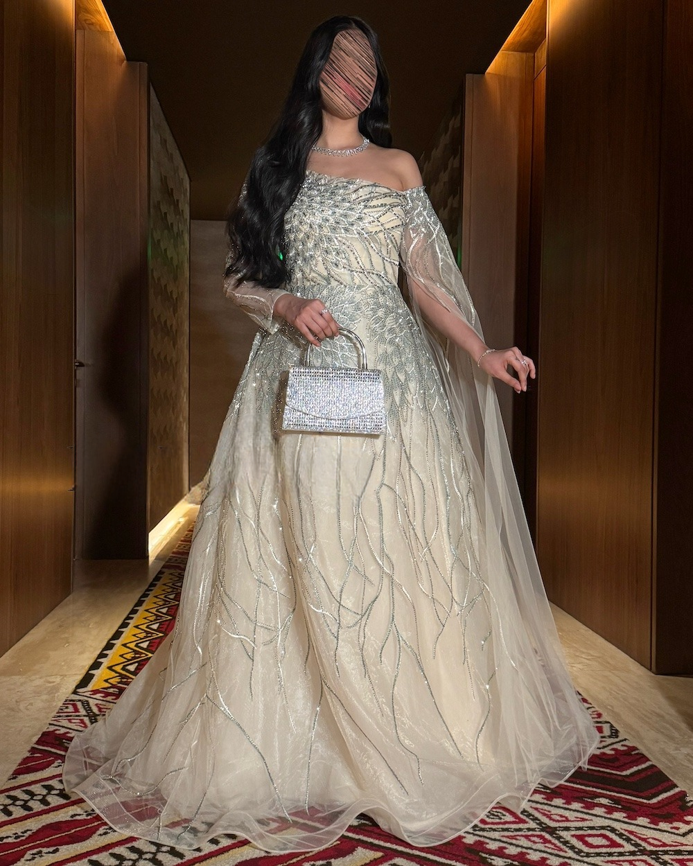 Luxury beige evening dress with sheer sleeves