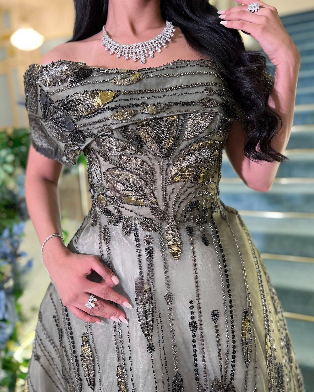 Gray evening dress with gold and glitter accents