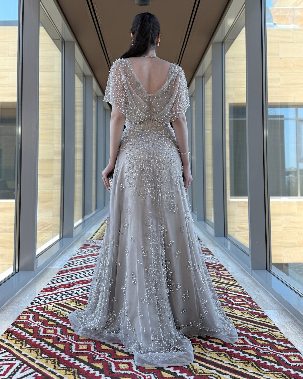 Sugar evening dress with pearl embroidery from head to tail
