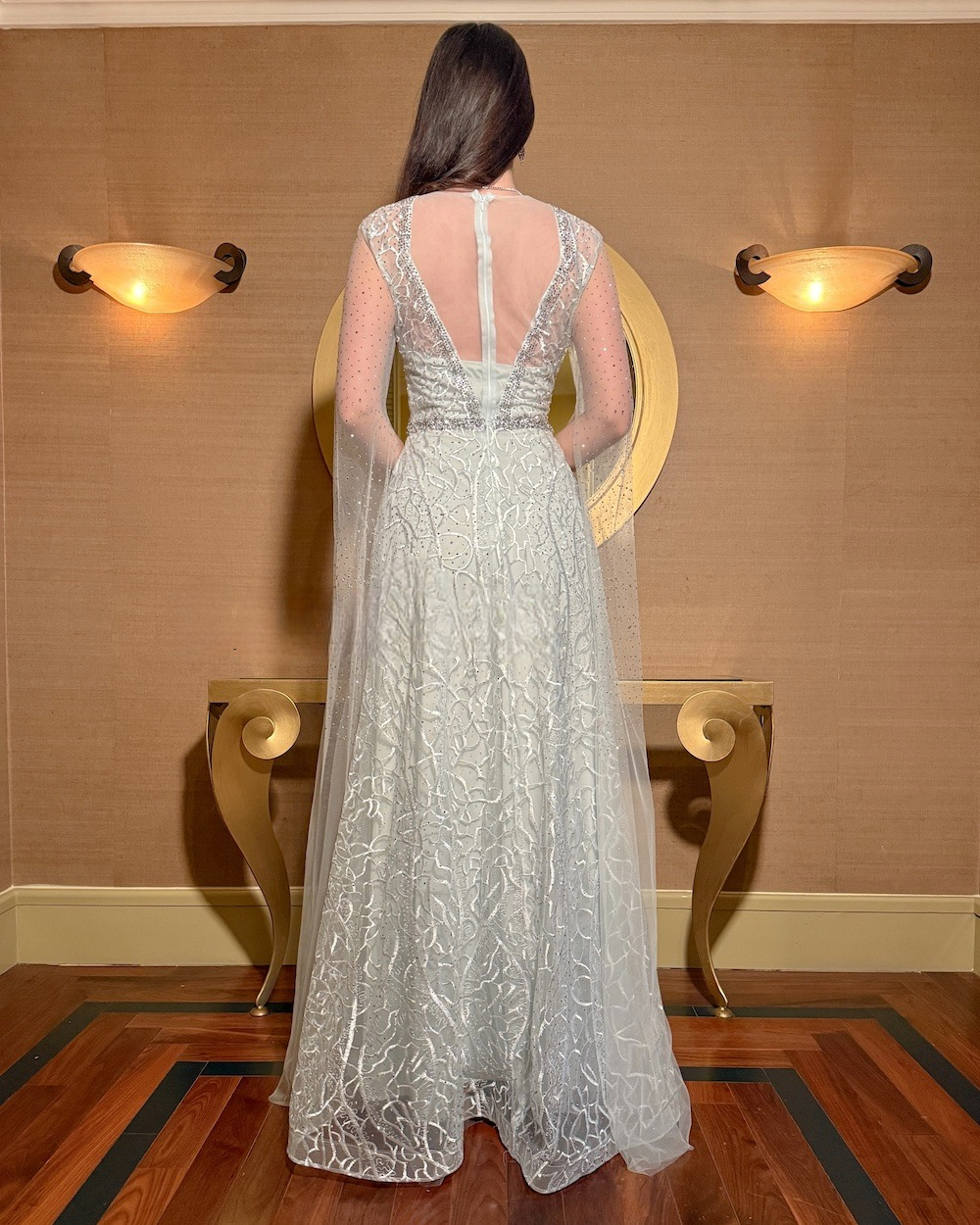 Long evening dress with sheer cape sleeves