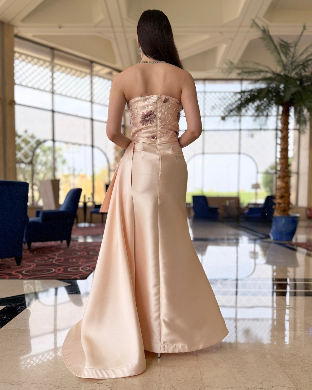 Creamy beige evening dress with side train