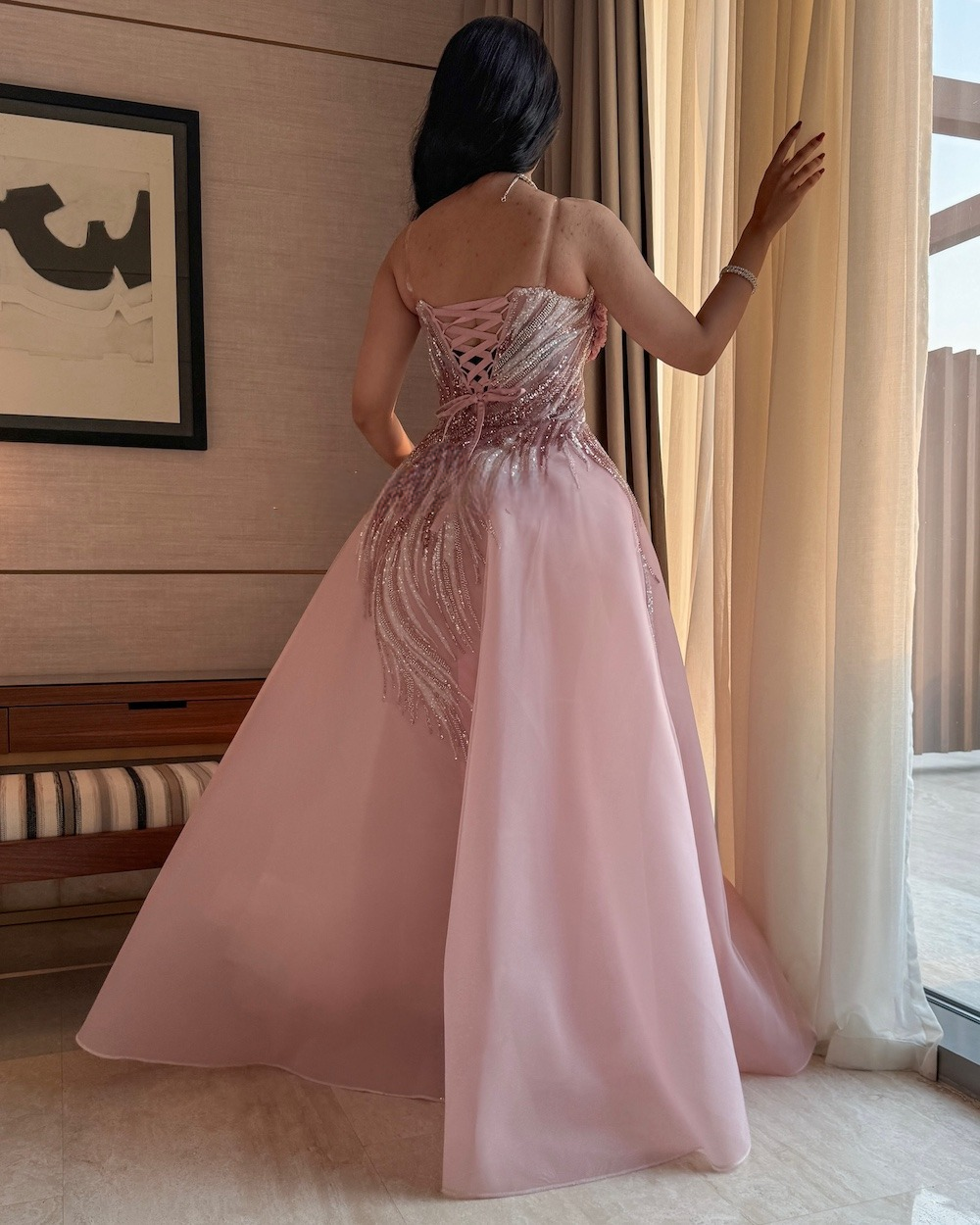 Pink evening dress with wavy sequin decoration