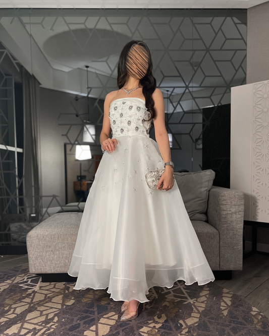 فستان سهرة غازار أبيض عاجي مع دانتيل