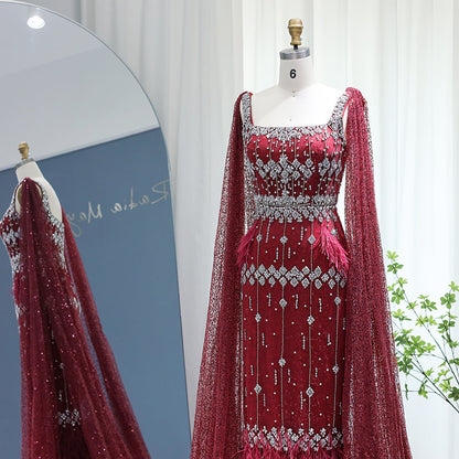 فستان سهرة فاخر رمادي اللون بأكمام مستقيمة من الريش