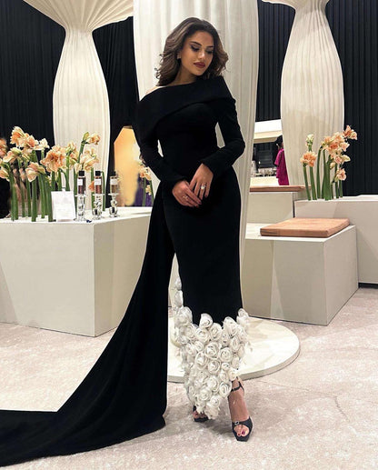 فستان سهرة أسود أنيق بأكمام طويلة مزين بزهور ثلاثية الأبعاد